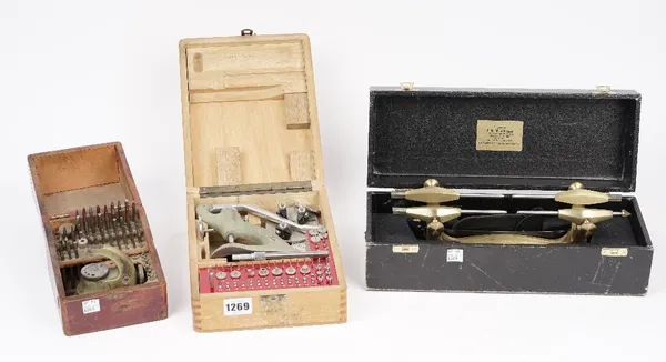 A Horologists 'Jewelling' tool by 'Favorite', cased, a brass depthing lathe, cased, and one further jewelling tool. (3)