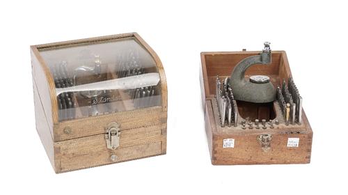 An MKS standard jewelling tool in a glazed wooden case and a similar, smaller jewelling tool. (2)
