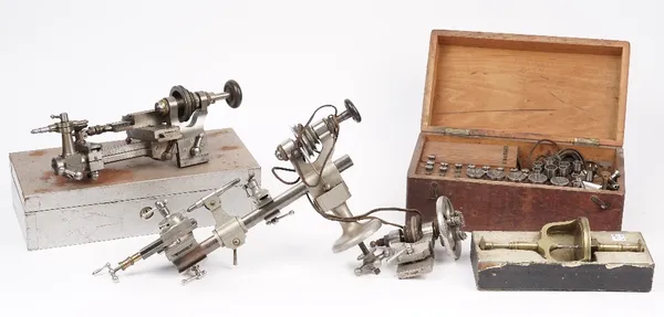 A Horologists steel lathe, a die set and related horological accessories. (qty)