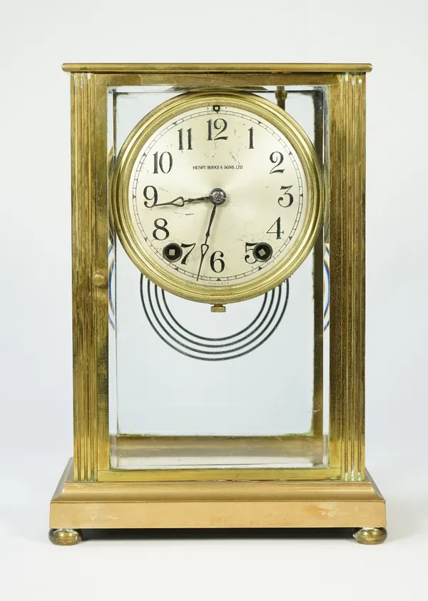 A brass cased four glass mantel clock, early 20th century, the silvered dial detailed 'HENRY BIRKS & SONS LTD' with an American two train movement and