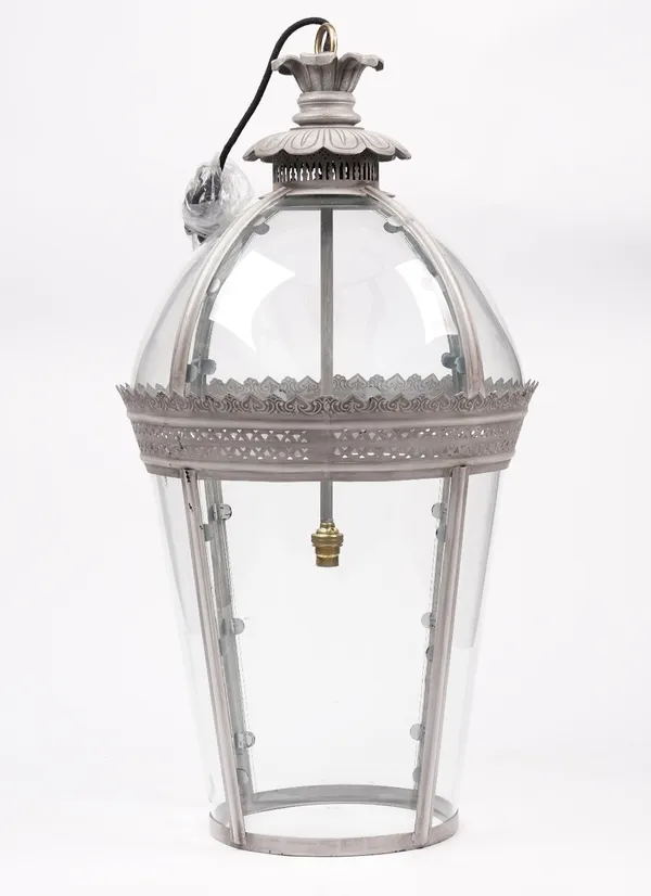 A Georgian style hanging lantern, modern, of domed tapering cylindrical form, with pierced metal grey frame and single light fitment to the interior,