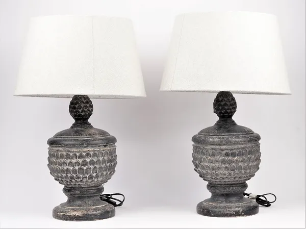 A pair of modern stone effect table lamps, each distressed grey against a leafy moulded baluster body, with shades, 67cm high overall, (2).