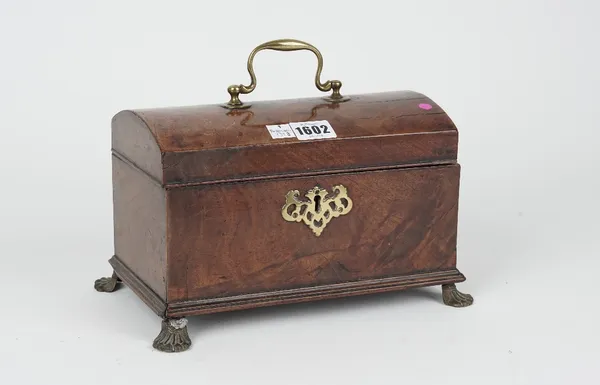 A mid-18th century mahogany dome top tea caddy on gilt metal paw feet, 27cm wide x 16cm high.