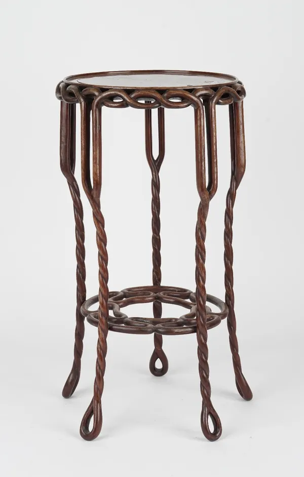 A Chinese hardwood plant stand, the circular top and frieze on pierced rope twist supports, united by similar undertier, 28cm diameter x 51cm high.