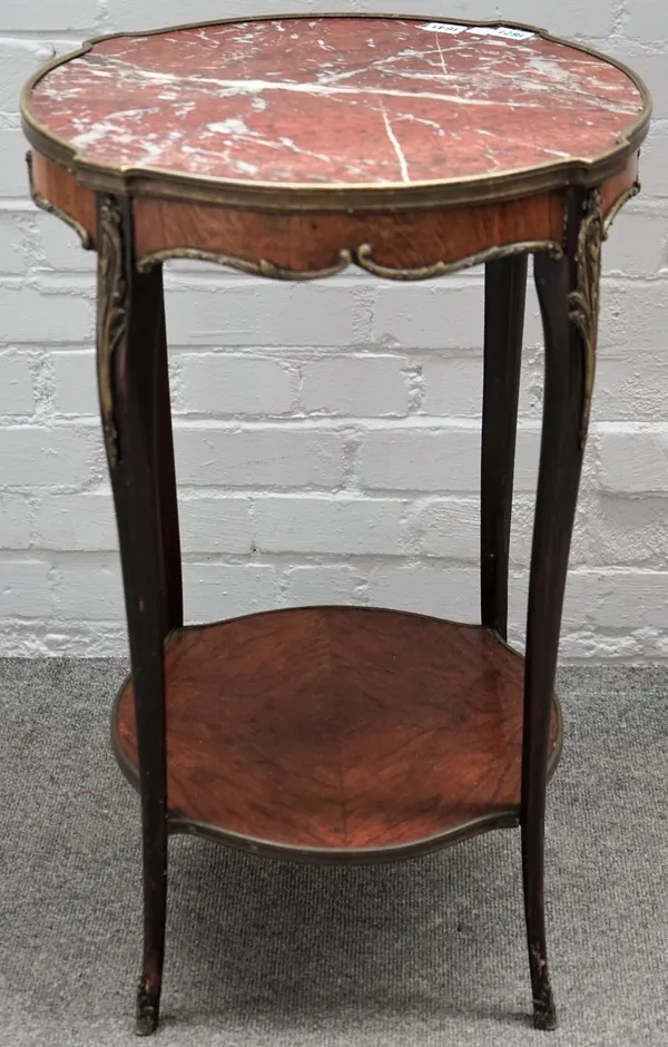 A 19th century French occasional table, the shaped marble circular top over a gilt metal mounted walnut base, with four cabriole supports united by pl