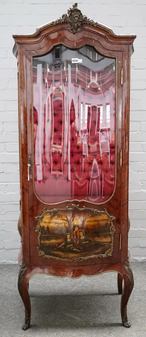 An early 20th century gilt metal mounted kingwood vitrine with serpentine door, bomb base and Vernis Martin style panel, 70cm wide x 166cm high.