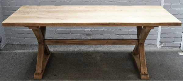 A 17th century style stripped oak plank top refectory table on 'X' frame supports, 85cm wide x 200cm long.