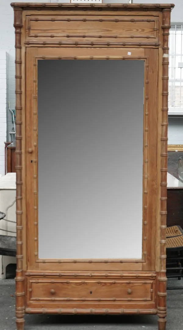 A 19th century French pitch pine faux bamboo mirrored single door wardrobe, 102cm wide x 212cm high.