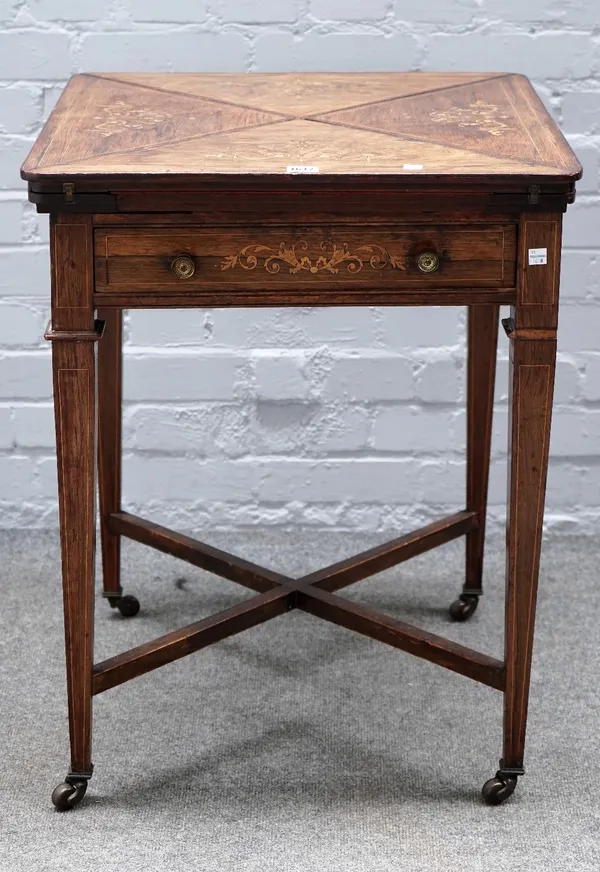 An Edwardian marquetry inlaid rosewood envelope card table, on tapering square supports, 56cm wide x 72cm high.