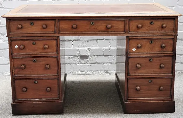 A Victorian mahogany pedestal desk, with nine drawers about the knee, 123cm wide x 73cm high.