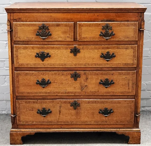 A mid-18th century oak chest with two short over three long graduated drawers, on bracket feet, 97cm wide x 100cm high.