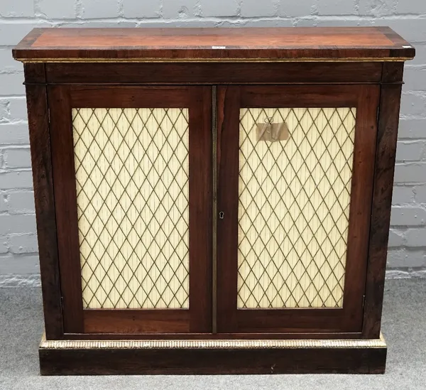 A 19th century rosewood side cabinet, with a pair of grille doors on plinth base, 97cm wide x 92cm high.