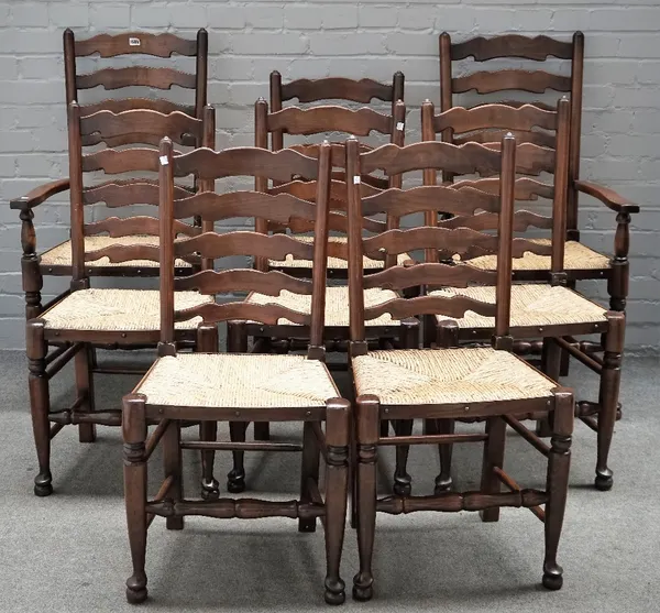 A set of eight stained beech Lancashire ladder back rush seat chairs, to include a pair of carvers, 20th century, (8).