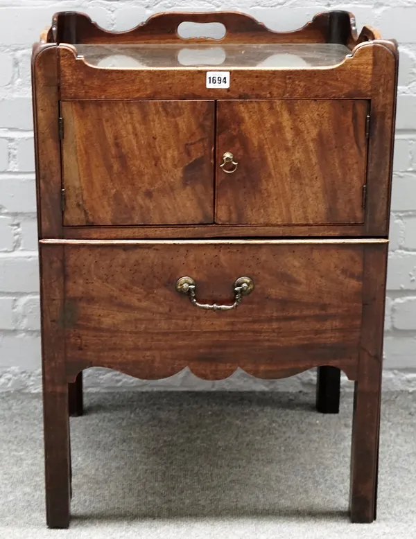 An 18th century mahogany tray top commode, with a pair of cupboards over a pull out, 51cm wide x 74cm high.