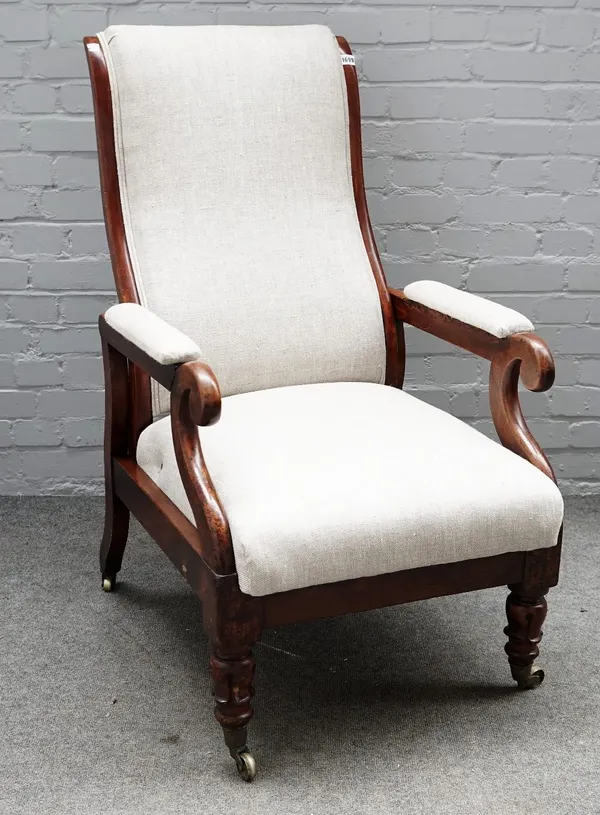 A William IV mahogany reclining open armchair, on lappet carved supports, 66cm wide x 112cm high.