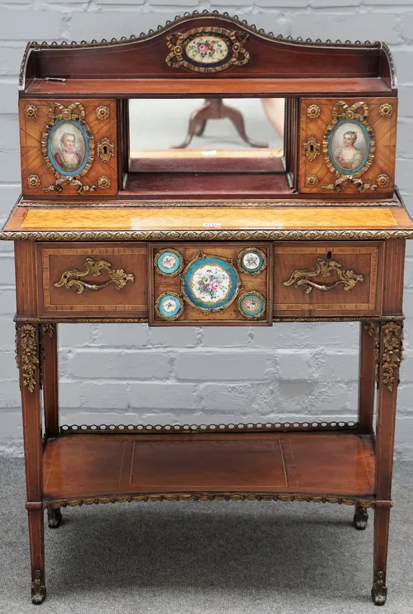 A Louis XV style Kingwood mahogany birds eye maple boxwood strung gilt metal mounted bonheur de jour, 19th century, inset with Sevres style porcelain