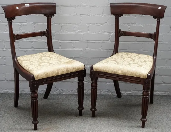 A pair of Regency mahogany side chairs on reeded supports, 48cm wide x 86cm high.