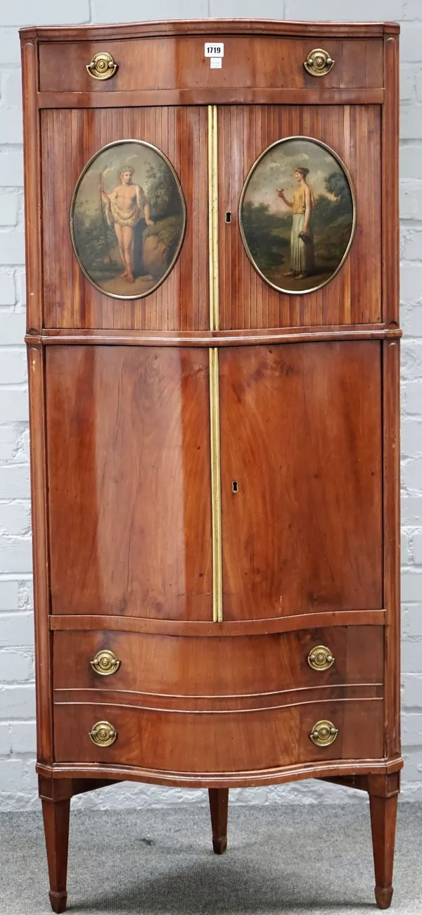 WITHDRAWN  A 19th century Continental mahogany serpentine corner cabinet, with a pair of oval painted panels, 66cm wide x 158cm high.