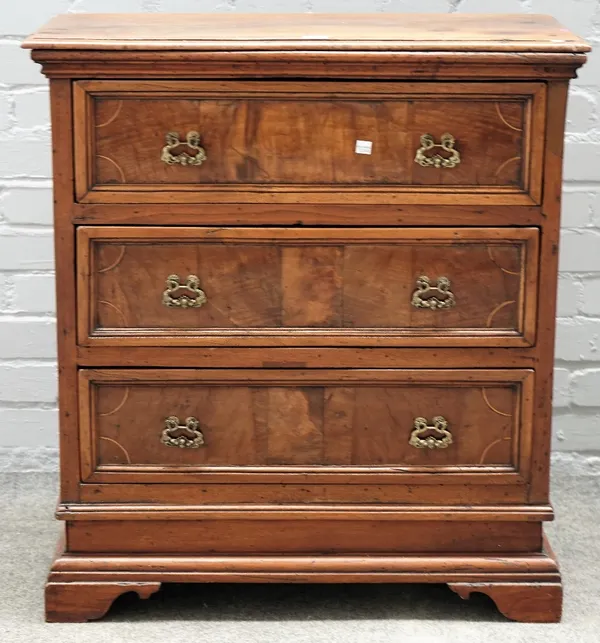 An 18th century Italian walnut small chest of three long drawers, on bracket feet, 73cm wide x 81cm high.