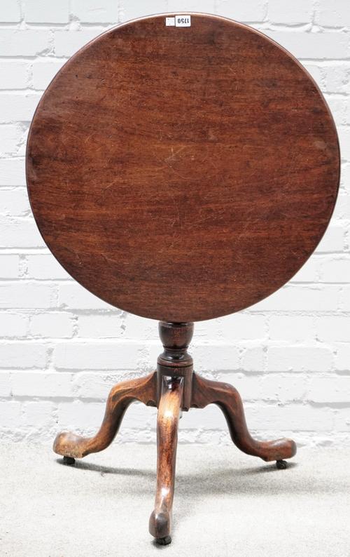 A mid-18th century mahogany circular snap top tripod table on bird cage mount, 67cm diameter x 73cm high.