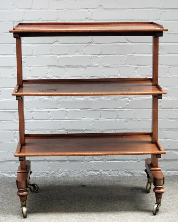 A George IV mahogany three tier dumb waiter on trestle supports, 91cm wide x 116cm high.