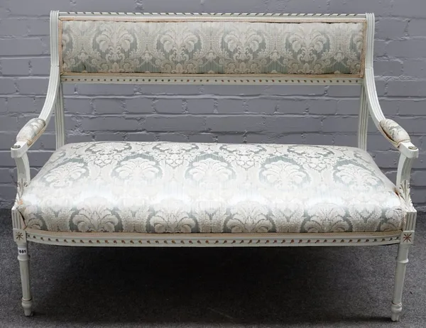 A Louis XVI style blue painted openarm sofa, on fluted supports, 113cm wide x 87cm high.