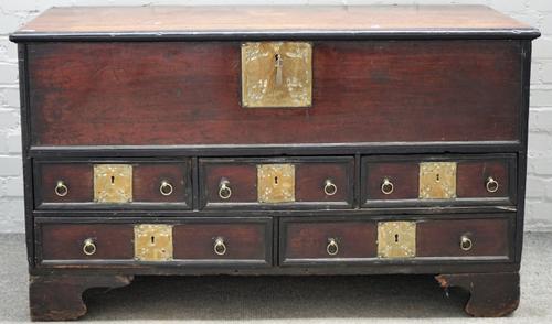 A 19th century Indian brass mounted teak mule chest, the lift top over five drawers on bracket feet, 138cm wide x 80cm high.