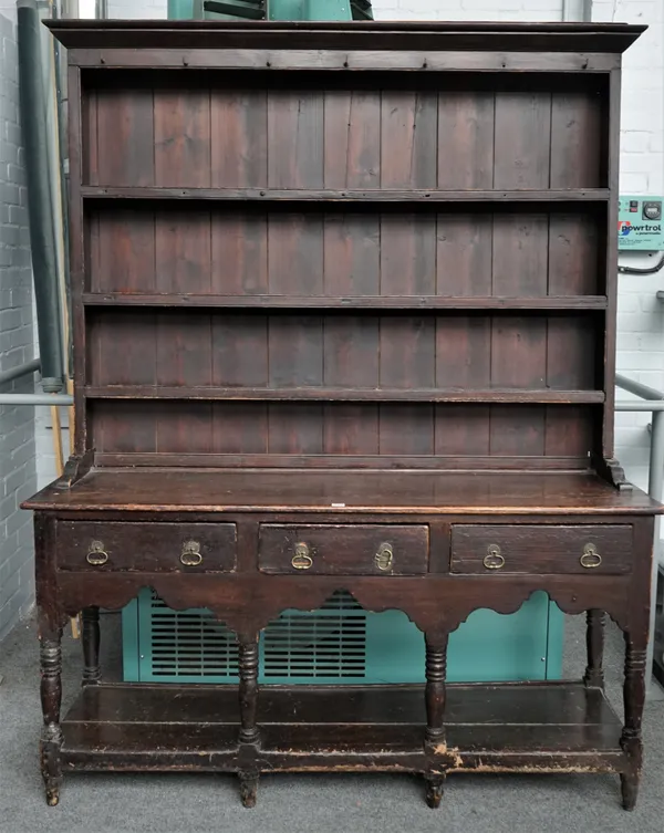 A George III pine dresser, the enclosed two tier back over three drawers united by pot board undertier, 163cm wide x 204cm high.