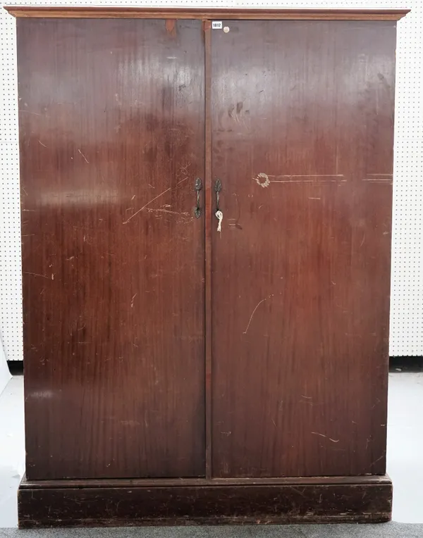 COMPACTON 143 REGENT ST LONDON, an early 20th century mahogany fitted two door wardrobe, 128cm wide x 172cm high.