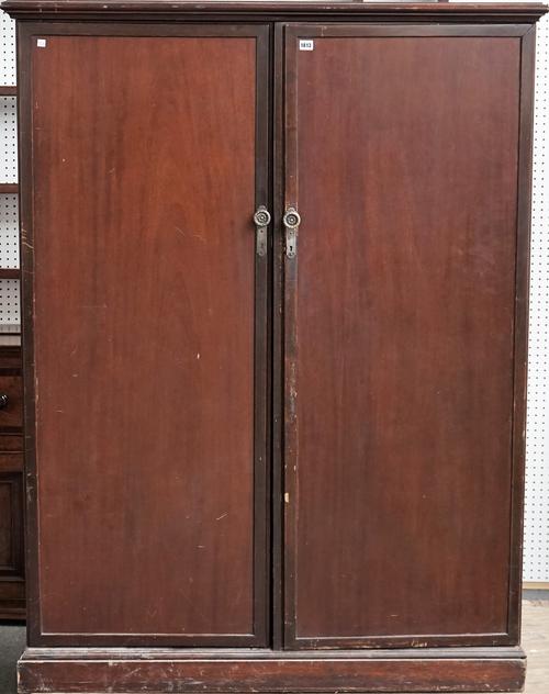COMPACTON 143 REGENT ST LONDON, an early 20th century mahogany fitted two door wardrobe, 128cm wide x 168cm high.