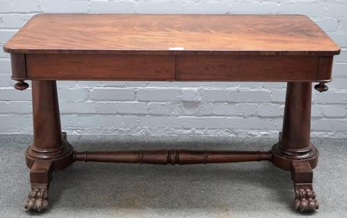 A George III mahogany two drawer rectangular centre table, on turned supports and carved paw feet, 127cm wide x 71cm high.