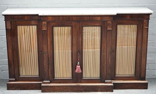 A Regency marble top rosewood breakfront side cabinet with four door base, 169cm wide x 92cm high.