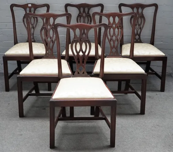 A set of six George III style mahogany pierced splat back dining chairs, on block supports, 52cm wide x 92cm high, (6).