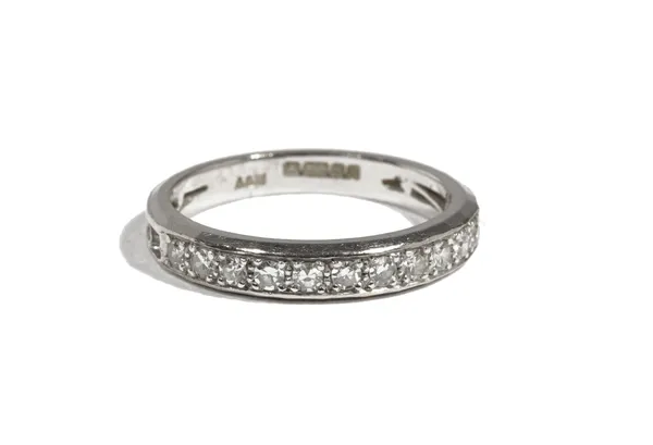 An 18ct white gold and diamond-set half-hoop eternity ring, set with eleven circular-cut diamonds, approximate total diamond weight 0.25ct, to openwor