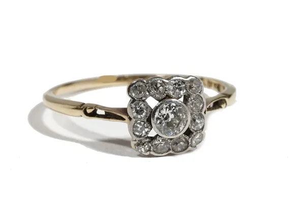 A gold and diamond-set dress ring of square cluster design, collet set with cushion cut diamonds, ring size O, 1.7g gross combined.