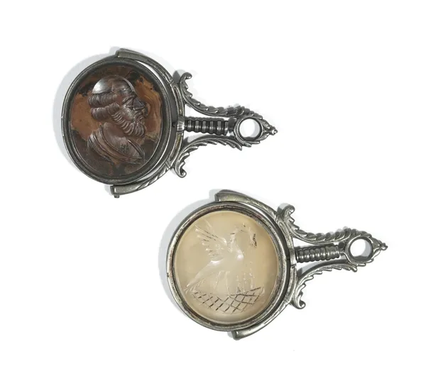 A late 18th/early 19th century brown agate set swivel fob, intaglio carved with bust of a bearded gentleman, set in a base metal mount; and another ch