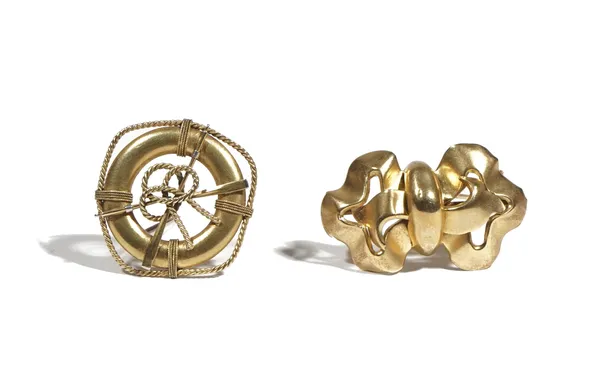 A 15ct gold brooch in the form of a life belt, Registered Number 225830, weight 5.3g; and a yellow precious metal brooch in the form of a bow 4.6g (2)