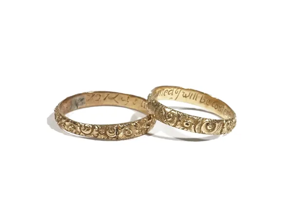 A yellow precious metal band ring, cast with repeat flowerheads and inscribed to the inner band 'Whom God appointed I will be contented' ring size P,