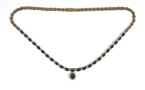 A gold, sapphire and diamond-set pendant necklace, the oval-cut sapphire and diamond cluster pendant suspended from a necklace set with alternating ov