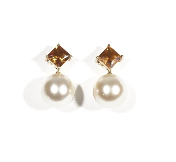 A pair of citrine and cultured pearl pendent earrings by Autore, the square-cut citrine claw-set earstuds, suspending South Sea cultured pearls, measu