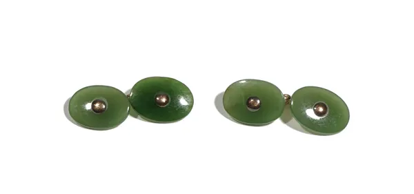 A pair of nephrite cufflinks, having oval backs and fronts.