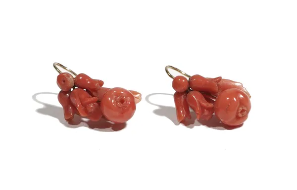 A pair of coral earrings, or carved floral design, Italian mid-19th century.