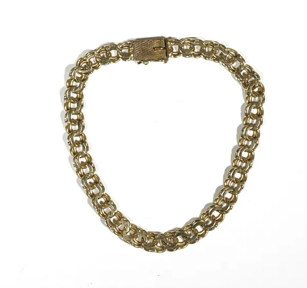 A gold bracelet, in an entwined double link design, on a snap clasp, detailed 10 KT, length 18.5cm, weight 8.8 gms.