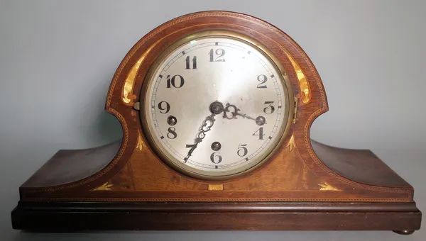 A late Edwardian inlaid mahogany mantel clock, on bun feet, 46cm wide x 20cm high.