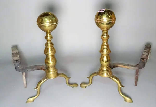 A pair of early 20th century brass and cast iron andirons, 42cm high, (2).