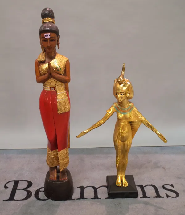 A large modern hardwood carved and painted figure of an Asian lady and a modern gilt figure of an Egyptian goddess, 95cm high, (2).