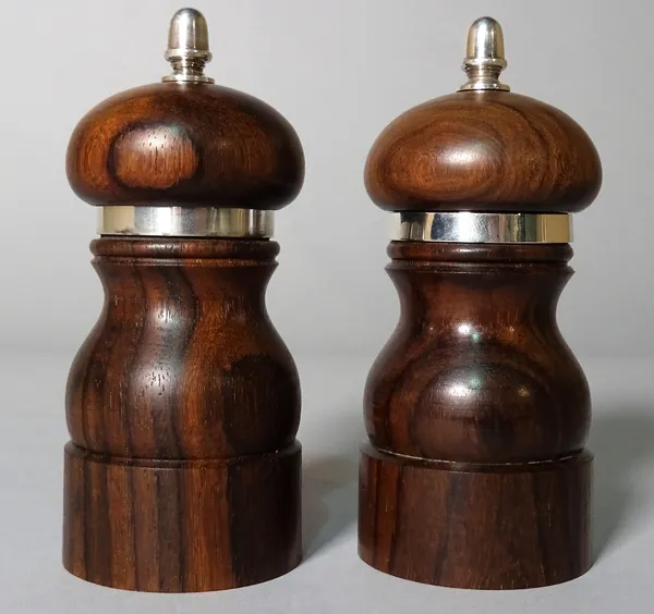 A pair of modern silver mounted hardwood pepperettes, 11cm high, (2).