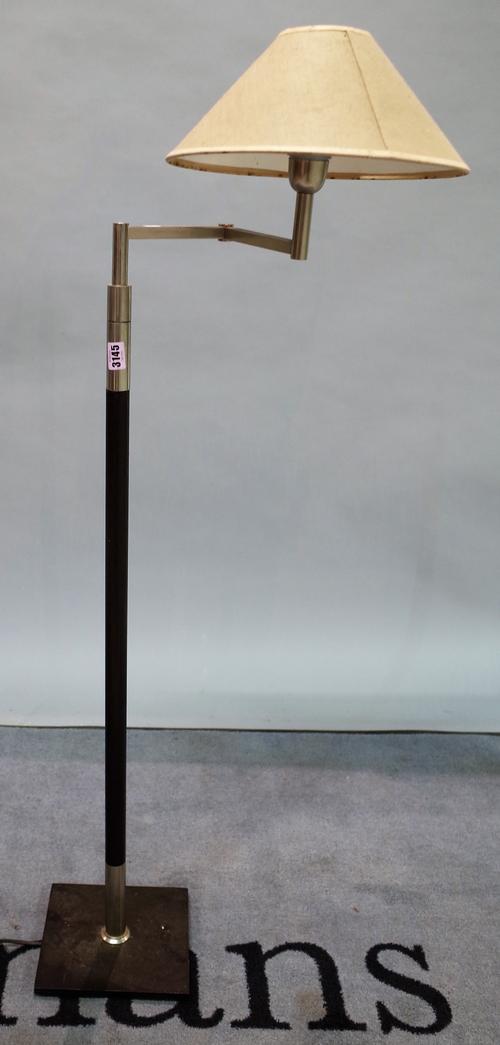 A 20th century chrome and hardwood reading lamp, on square plinth base, 120cm high.