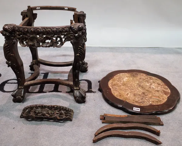 An early 20th century Chinese hardwood stand, inset with a marble top, 41cm wide x 45cm high.