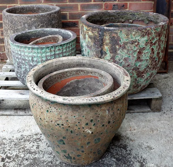 A quantity of modern garden pots of various sizes, the largest being 57cm wide x 50cm high (12).